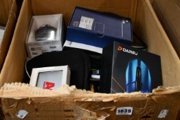 A box of assorted as new and pre-owned small electrical items and accessories.