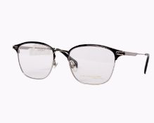 A pair of as new William Morris glasses frames with clear glass (RRP £250).