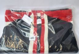 An as new Madeleine Thompson Flora poncho (RRP £520).