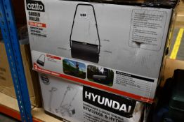 A boxed as new Hyundai lawn mower and an Ozito garden roller.