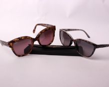 Two pairs of as new Maui Jim sunglasses.