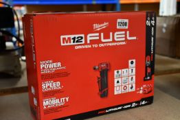 A boxed as new Milwaukee Angled Grinder to include batteries and charger (M12 FDGA-422B).