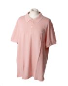 Seven men's as new Lacoste cotton pique polo shirts in pale rose (5 L, 6 XL and 7 XXL).
