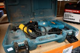 A pre-owned Makita 8406C diamond core and hammer drill (body only).