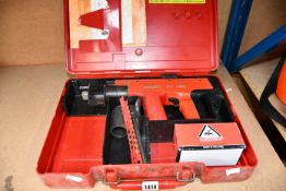A pre-owned Hilti DX-450 nail gun.