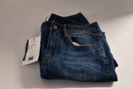 A pair of as new G-Star Saddle Boyfriend jeans (W24/L32 - RRP £105) and a pair of as new G-Star Lynn