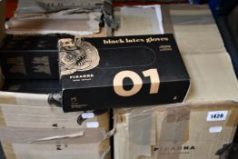Nineteen boxes of 100 Piranha Tattoo Supplies black latex gloves.