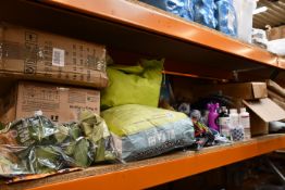 A large quantity of pet related items food, collars and shampoos.