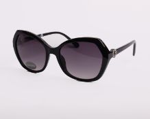 A pair of as new Swarovski sunglasses (RRP £120).