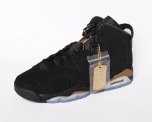One pair of boxed as new Nike Air Jordan 6 Retro DMP in black (UK 5).