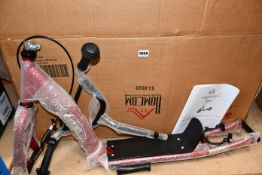 Two boxed as new inflatable wheel Scooters (Blue and crimson).