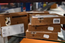 Seven boxes of twelve as new Markmen 933 white touch dry ink rolls.