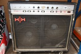One Pre-owned HH Electronics combo vintage amplifier LC100 (Some damage to casing and and castors).