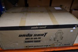 One boxed as new Anda Seat AD5-01 gaming chair in black and red.