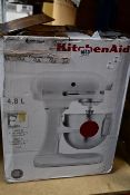 One boxed KitchenAid 4.8L kitchen mixer in red.
