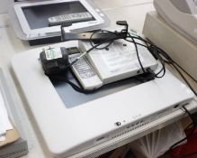 A Nidek SC-1600 system chart together with a Mallett I.O.O. unit.