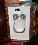 A boxed as new No Face mini petite facial toning device.