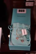 A pre-owned sterling silver Tiffany & Co necklace with two heart pendants.