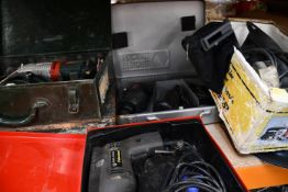 A pre-owned Black and Decker Proline hammer drill with batteries and charger, a pre-owned Metabo