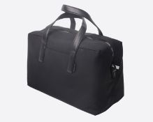 An as new Away holdall with dust sleeve.