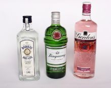 Two Gordons premium pink gin (2 x 700ml), two Tanqueray dry gins (2 x 700ml), and one Bombay