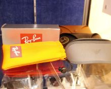 Six pairs of branded pre-owned sunglasses.