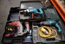 A pre-owned Makita HR2450T hammer drill (body only), a pre-owned Makita hammer drill (body only) and