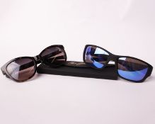 Two pairs of as new Maui Jim sunglasses.