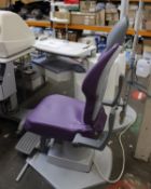 A Keeler compact refraction stand unit with chair.