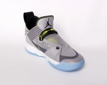 Two pairs of boxed as new Nike Air Jordan XXXIII SE in cement grey and black (UK 6, 6.5).