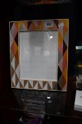 A Linley Henley triangle photo frame (RRP £355).