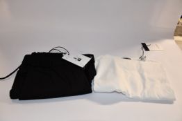 A pair of as new L'Estrange The 24 trousers in black (XS - RRP £125) together with a The Tailored