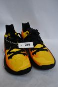 A pair of as new Nike Air Kyrie Sunset low top trainers (UK 11 - No box).