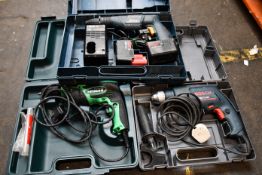 A pre-owned Bosch GSB9,6 VES-2 hammer drill, a pre-owned Bosch GSB 13RE hammer drill (body only) and