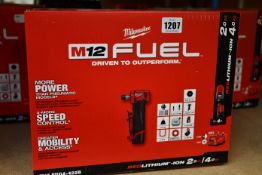 A boxed as new Milwaukee Angled Grinder to include batteries and charger (M12 FDGA-422B).