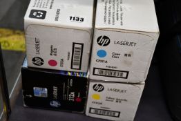 Four boxed as new HP LaserJet cartridges (CF211A cyan, CF212A yellow and CF213A, CF383A magenta).