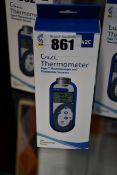 One boxed a new Comark C42C food thermometer.