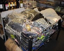 One large basket full of as new miscellaneous clothing.