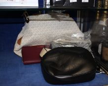 A pre-owned Michael Kors handbag, a pre-owned Stella McCartney's small black shoulder/cross over