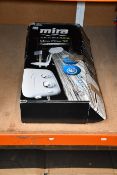 One boxed as new Mira Elite SE silent pump electric shower in white and chrome.