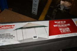 An as new Coleman instant canopy sun shade (13ft x 13ft).