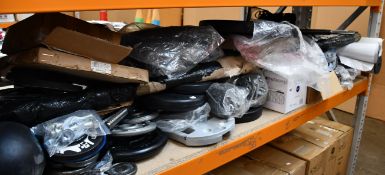 A quantity of miscellaneous gym related items to include yoga mats, resistance straps and weights.