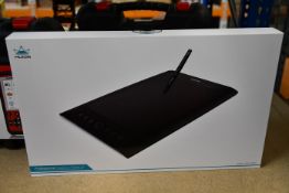 A boxed as new Huion Graphics Drawing Pen Tablet H610 Pro. 8192 Levels of Pressure Sensitivity. 10 x