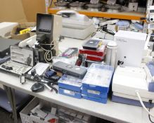 A quantity of assorted ophthalmic equipment/spectacle repair items to include Neitz