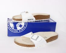 One pair of Birkenstock Madrid Big Buckle (UK 6) and one other pair in white (UK 7), both as new.
