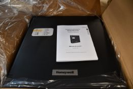 A boxed as new Honeywell HLSPS50 EN54-4 4V 5Ah Power Supply Unit (Box opened).