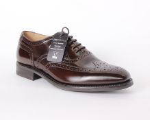 One pair of man's boxed as new Loake dark brown leather polished brogues (UK 7).