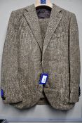 An as new Suit Supply Jort Ferrara three piece camel-herringbone tweed suit (26/42S - RRP £799).