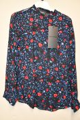 An as new The Kooples Poison Roses on Georgette blouse (Size 1 - RRP €168).