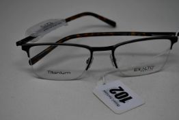 A pair of as new Exalto glasses frames with clear glass (RRP £270).